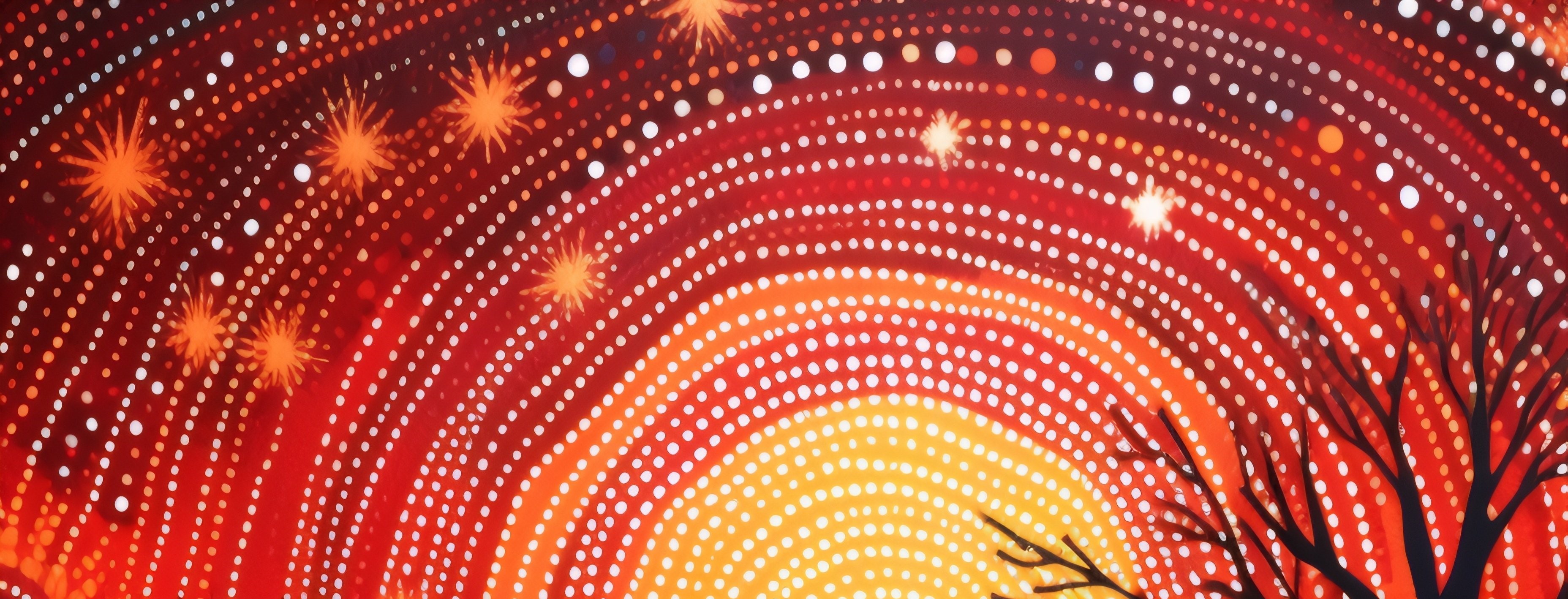 Aboriginal-inspired dot artwork in warm red, orange and yellow tones